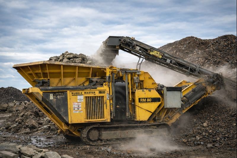 RM 80 crusher actively processing concrete on site